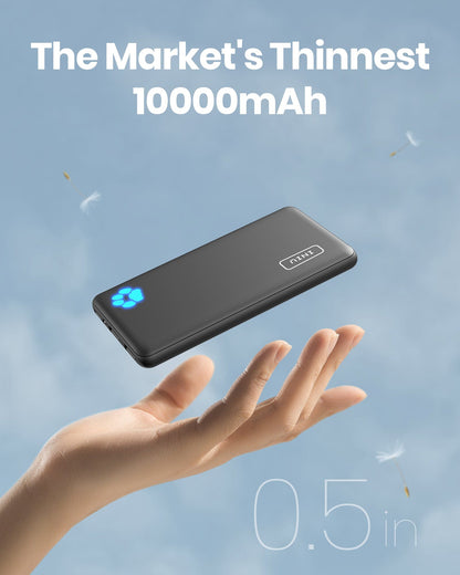 INIU B41 10000mAh power bank, slim black design, floating, sky background.