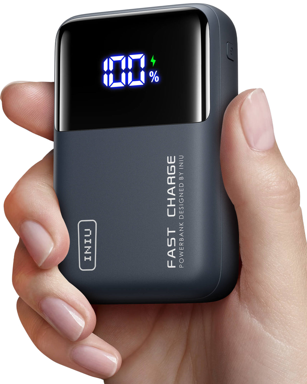 INIU Cougar P63-E1 Power Bank in hand, showing 100% charge display and FAST CHARGE.