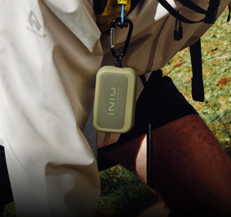 Lightweight Rugged 10000 clipped to a hiking backpack